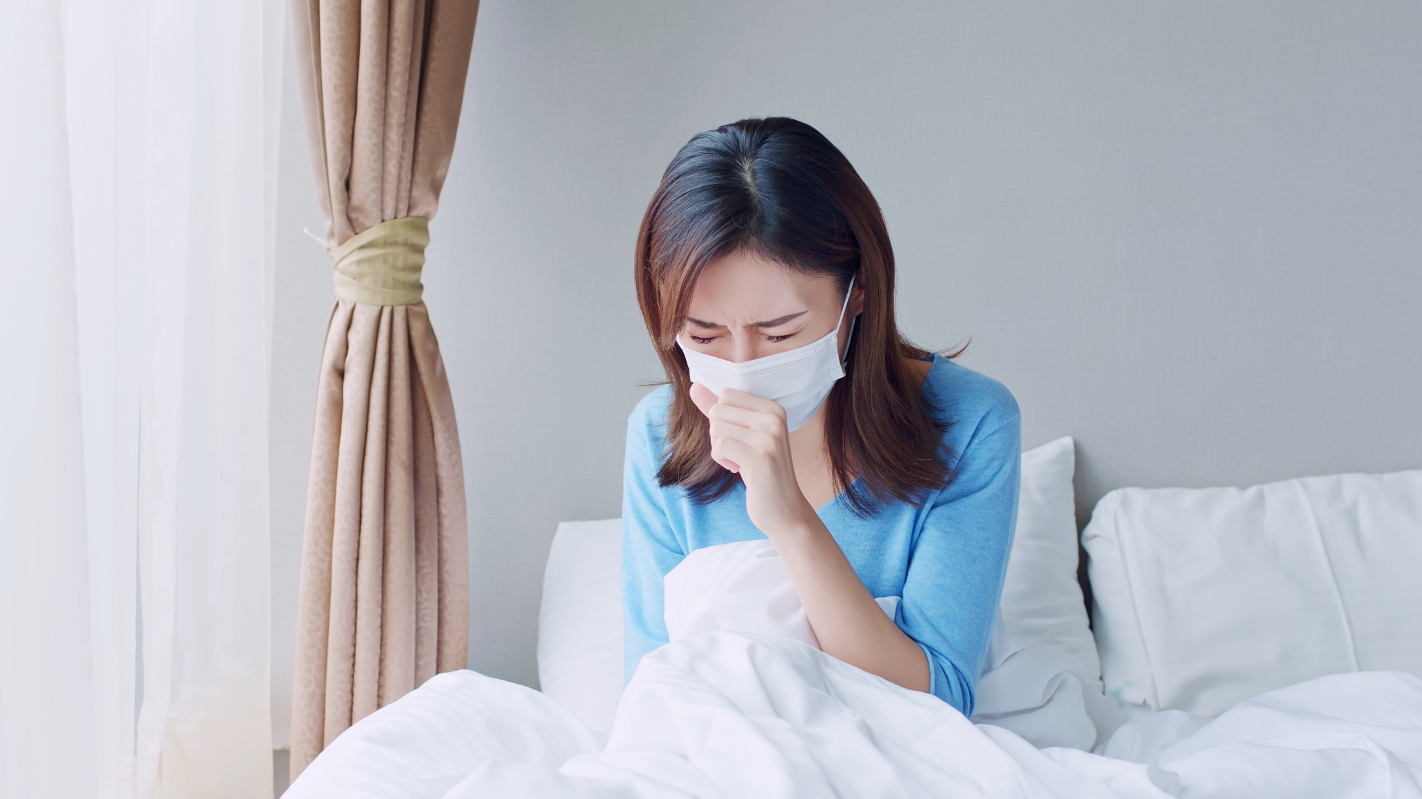 Woman Cough in Bedroom.